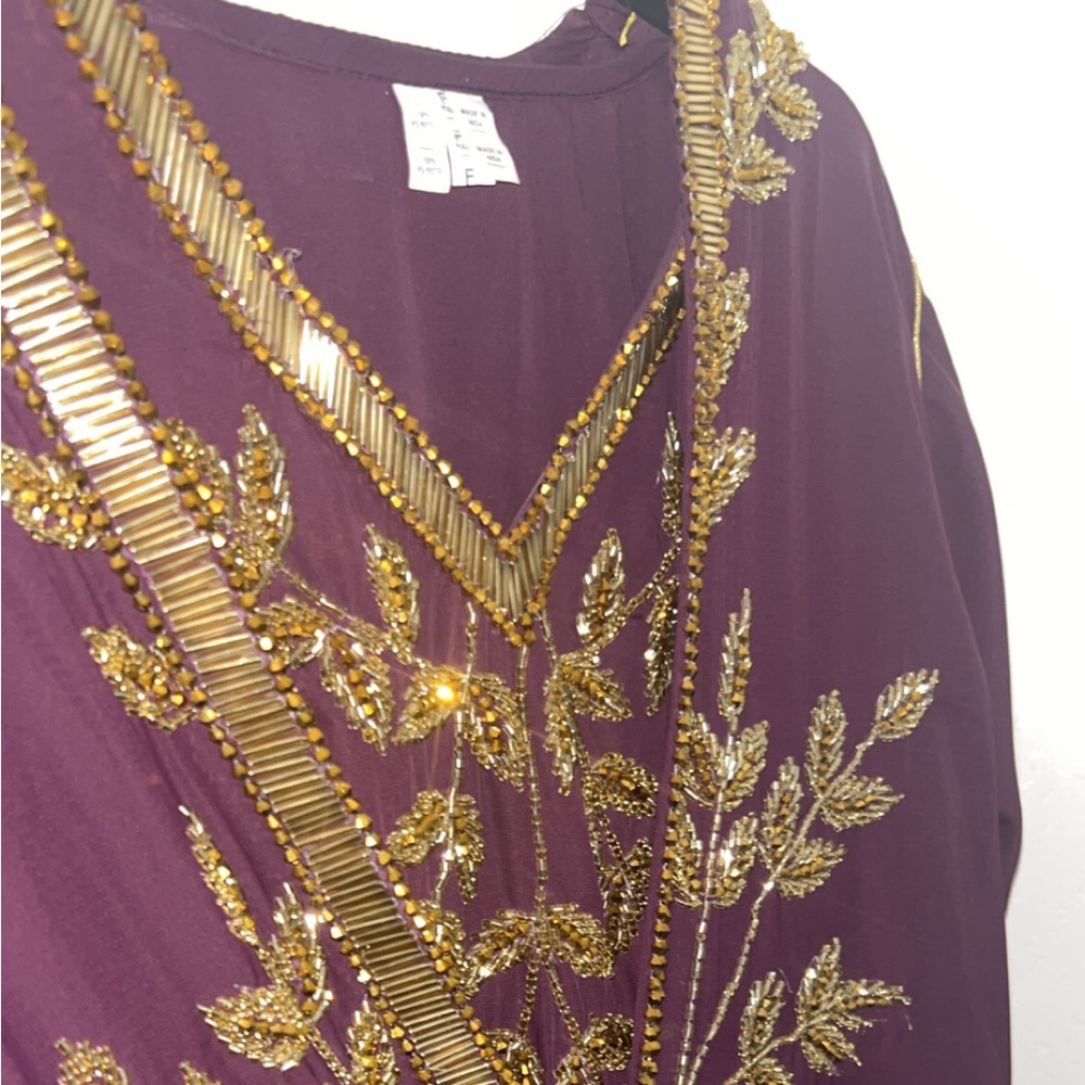 Purple Dress with Gold Embellishments